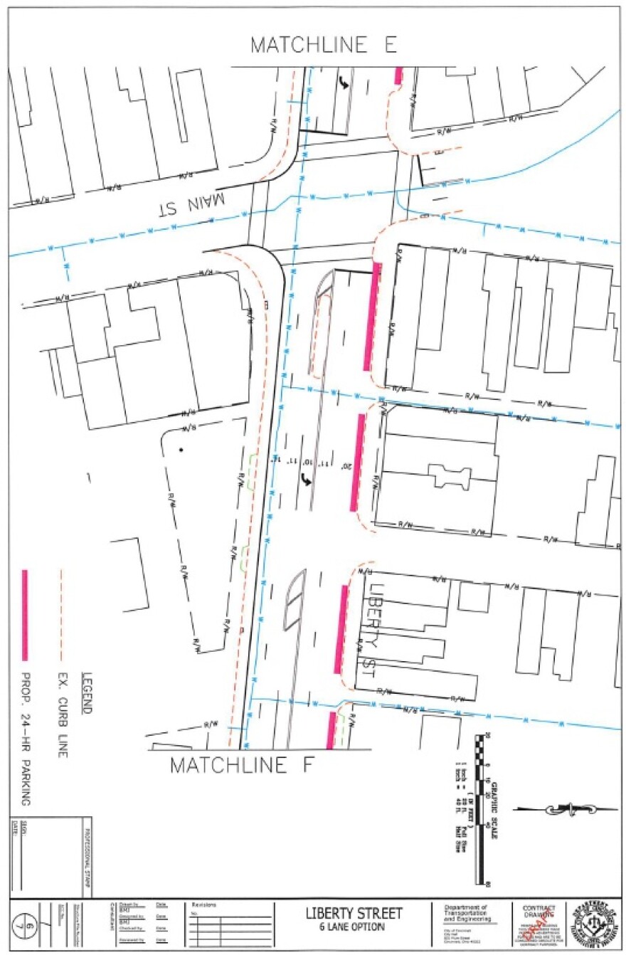 The latest version of the Liberty Street road diet has four travel lanes, a center turn lane and medians in places, as well as 24-hour parking on the north side of the street. 